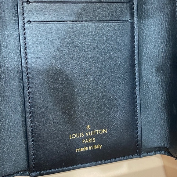 LOUIS VUITTON
Black Leather New Wave Compact Wallet - Picture 9 of 14